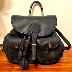 Dooney And Bourke Black All Weather Leather Backpack Purse Drawstring Bag